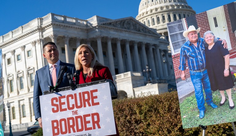 Rep. Tony Gonzales (R-TX) left, and Rep. Marjorie Taylor Greene (R-GA) hold a news conference on border security after the deaths of a Georgia couple, Jose Lerma, 67, and Isabel Lerma, 65, near Batesville, Texas, who were killed in a high-speed chase involving migrant smugglers, at the Capitol in Washington, Tuesday, Nov. 14, 2023.