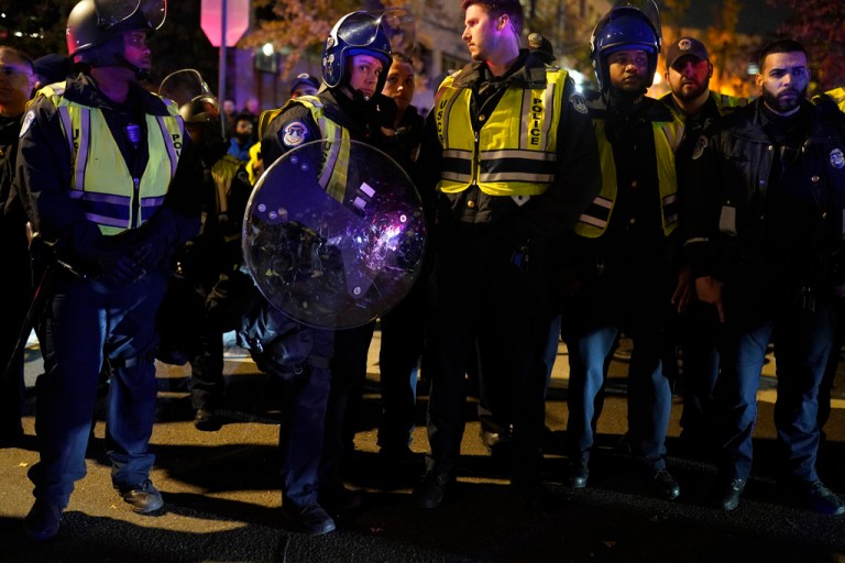 U.S. Capitol Police officers stand outside the headquarters of the Democratic National Committee Wednesday, Nov. 15, 2023, in Washington. 