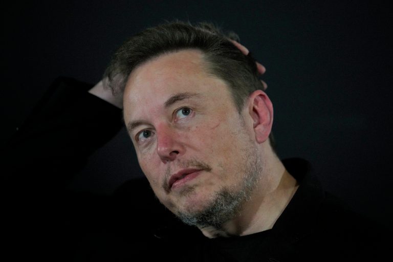 Elon Musk reacts during an in-conversation event with British Prime Minister Rishi Sunak in London, Thursday, Nov. 2, 2023. 