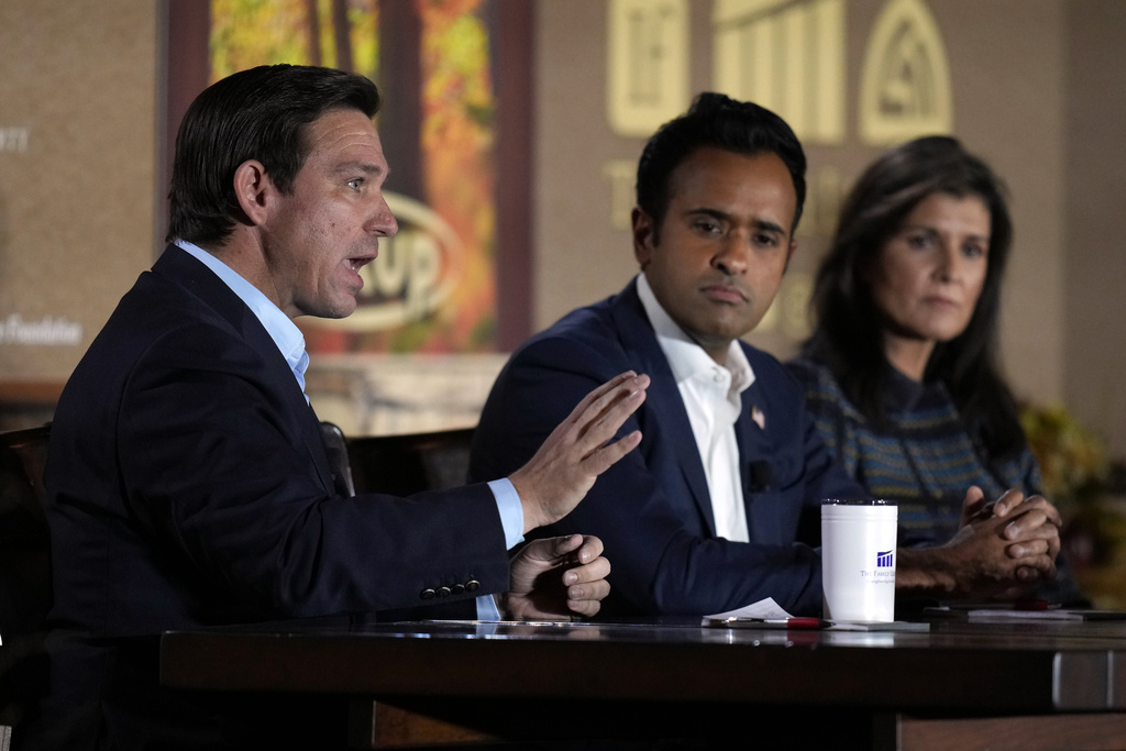Climate protester interrupts 2024 hopefuls at Iowa evangelical forum