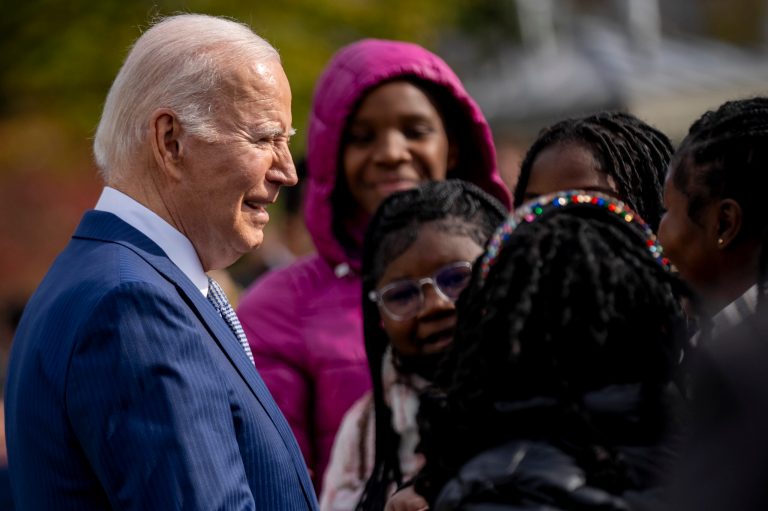 President Joe Biden speaks with guests after pardoning the national Thanksgiving turkeys, Liberty and Bell, at a ceremony on the South Lawn of the White House in Washington, Monday, Nov. 20, 2023. 