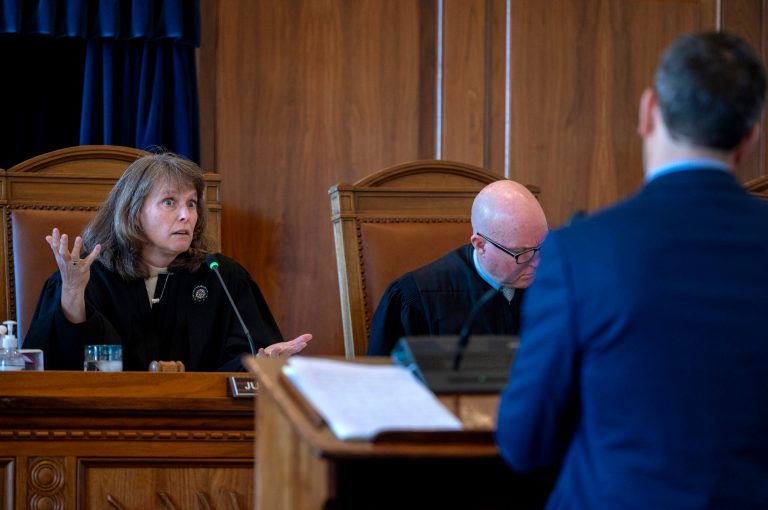 New Mexico Supreme Court Chief Justice Shannon Bacon, left, and Justice David Thomson question attorney Carter Harrison, representing the Republican Party of New Mexico, during oral arguments of an appeal for the redrawn borders of New Mexico's 2nd Congressional District, Monday, Nov. 20, 2023.
