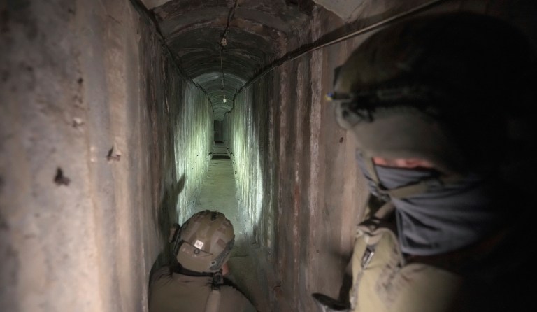 Israeli soldiers show the media an underground tunnel found underneath Shifa Hospital in Gaza City, Wednesday, Nov. 22, 2023.