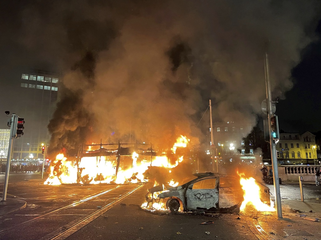 Riots break out in Dublin after stabbing attacks blamed on far-right