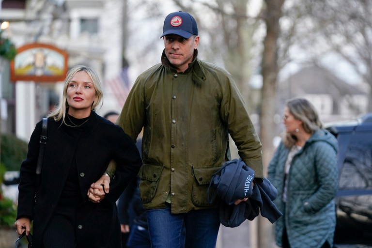 Hunter Biden walks with wife Melissa Cohen as they visit shops with President Joe Biden and first lady Jill Biden in Nantucket, Massachusetts, Friday, Nov. 24, 2023.