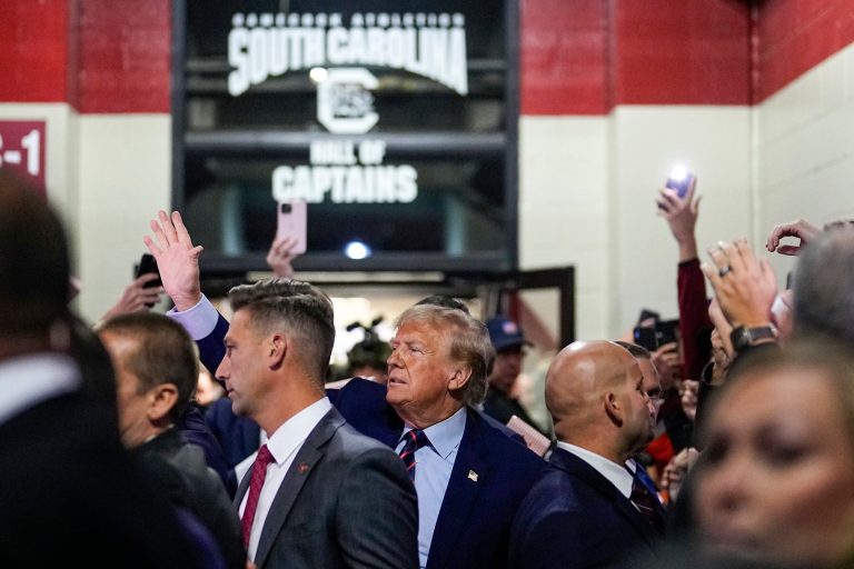 Republican presidential candidate and former President Donald Trump arrives before an NCAA college football game between South Carolina and Clemson, Saturday, Nov. 25, 2023, in Columbia, S.C.