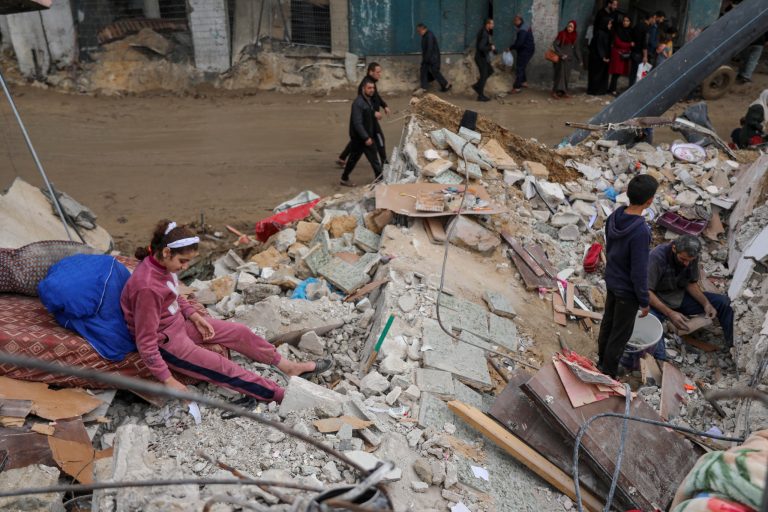 Palestinians search for their belongings from the rubble of a destroyed building in Jebaliya, Gaza Strip, Tuesday, Nov. 28, 2023, on the fifth day of the temporary ceasefire between Hamas and Israel. 