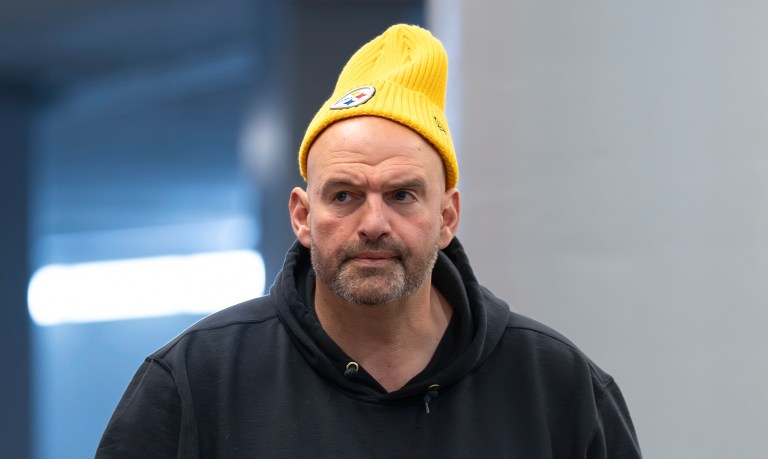 Sen. John Fetterman (D-PA) walks through a basement corridor at the Capitol on the way to a vote in the Senate on Tuesday, Nov. 28, 2023, in Washington.