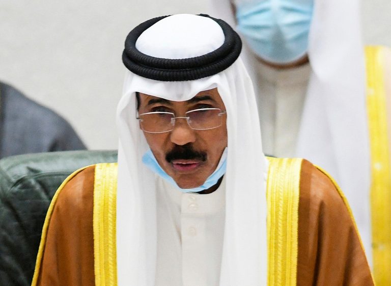 FILE - The Emir of Kuwait Sheikh Nawaf Al Ahmad Al Sabah performs the constitutional oath at the Kuwaiti National Assembly, in Kuwait, Sept. 30, 2020.  (AP Photo/Jaber Abdulkhaleg, File)
