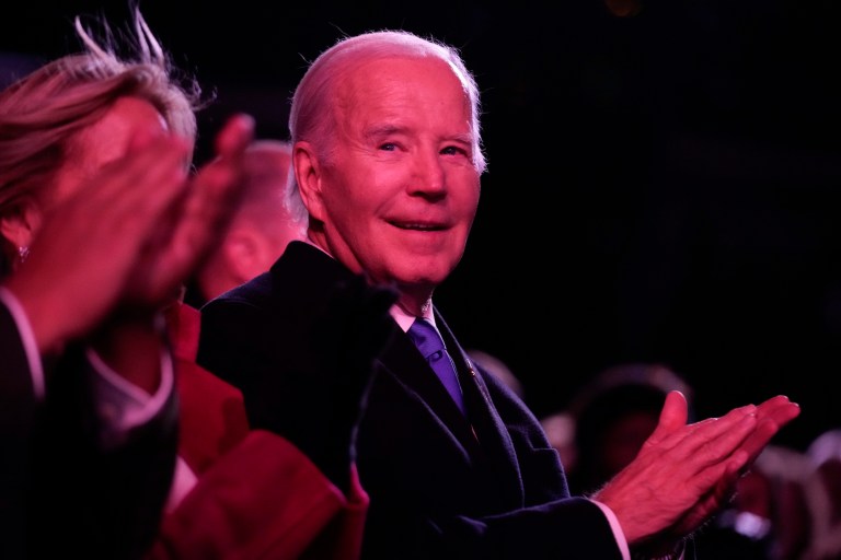 President Joe Biden applauds a performer after lighting the National Christmas Tree on the Ellipse, near the White House, Thursday, Nov. 30, 2023, in Washington. 