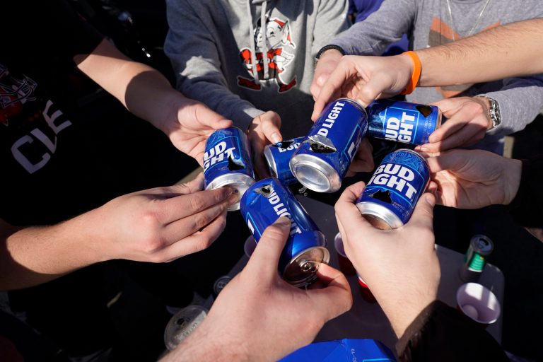 Cleveland Browns fans drink Bud Light beers before a game against the Los Angeles Rams on Sunday, Dec. 3, 2023, in Inglewood, California.