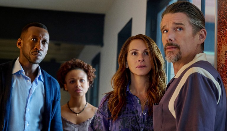 This image released by Netflix shows Mahershela Ali from left, Myha'la Herrold, Julia Roberts and Ethan Hawke in a scene from 