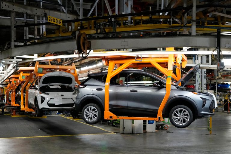 File - Vehicles move along the 2023 Chevrolet Bolt EV and EUV assembly line at the General Motors Orion Assembly on June 15, 2023, in Lake Orion, Michigan.