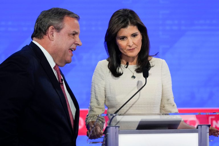 Former New Jersey Gov. Chris Christie, left, talking with former U.N. Ambassador Nikki Haley, right, during a commercial break at a Republican presidential primary debate hosted by NewsNation on Wednesday, Dec. 6, 2023, at the Moody Music Hall at the University of Alabama in Tuscaloosa, Alabama.