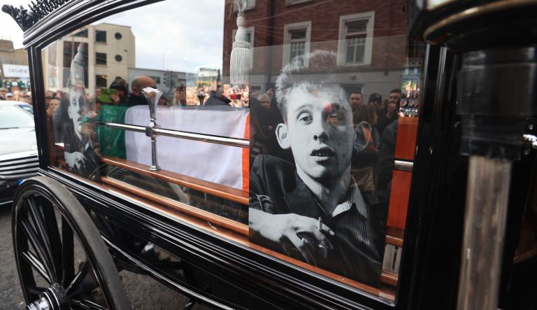 The funeral procession of Shane MacGowan makes its way through the streets of Dublin, ahead of his funeral in Co Tipperary, in Ireland, Friday, Dec. 8, 2023. MacGowan, the singer-songwriter and frontman of The Pogues, best known for their ballad âFairytale of New York,â died on Thursday, Nov. 30, 2023. He was 65.
