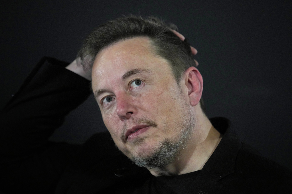 Biden agency puts Musk in its sights for allegedly firing employees who criticized him