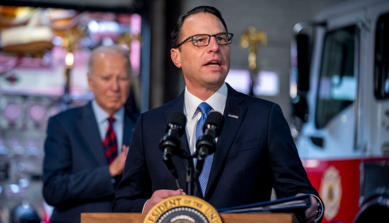 Gov. Josh Shapiro (D-PA), accompanied by President Joe Biden, left, speaks at Engine 13 in Philadelphia, Monday, Dec. 11, 2023, for an event recognizing that the city of Philadelphia is receiving a 22.4 million dollar SAFER Grant, which enables the Philadelphia Fire Department to reopen three fire companies. 