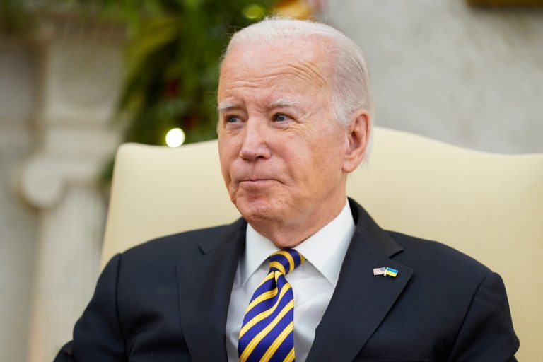 President Joe Biden is seen in the Oval Office of the White House, Tuesday, Dec. 12, 2023, in Washington.