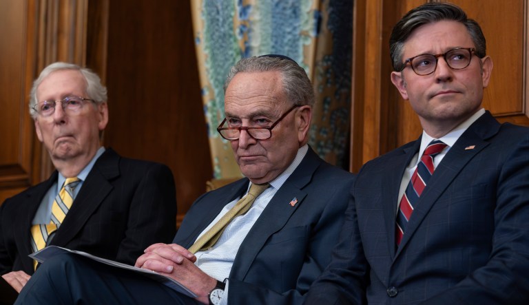 From left, Senate Minority Leader Mitch McConnell, R-Ky., Senate Majority Leader Chuck Schumer, D-N.Y., and Speaker of the House Mike Johnson, R-La., listen to remarks during a Hanukkah gathering at the Capitol in Washington, Tuesday, Dec. 12, 2023.