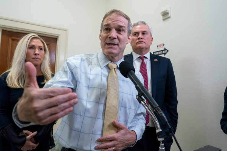 House Judiciary Committee Chairman Jim Jordan (R-OH) flanked by Rep. Marjorie Taylor Greene (R-GA), left, and House Oversight and Accountability Committee Chairman James Comer (R-KY), right, speaks to reporters after Hunter Biden, President Joe Biden's son, defied a congressional subpoena to appear privately for a deposition before Republican investigators who have been digging into his business dealings, at the Capitol in Washington, Wednesday, Dec. 13, 2023. Hunter Biden insisted outside the Capitol on Wednesday he'll only testify in public.