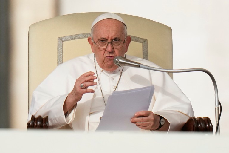 FILE - Pope Francis speaks during his weekly general audience in St. Peter's Square at The Vatican, on Oct. 18, 2023. Pope Francis has formally approved allowing priests to give 
