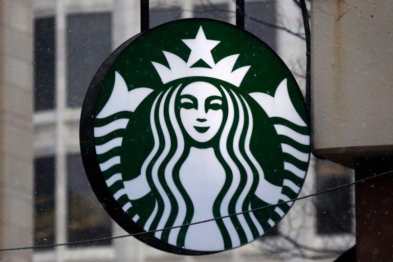 FILE - The Starbucks logo is seen, March 14, 2017, on a shop in downtown Pittsburgh. (AP Photo/Gene J. Puskar, File)