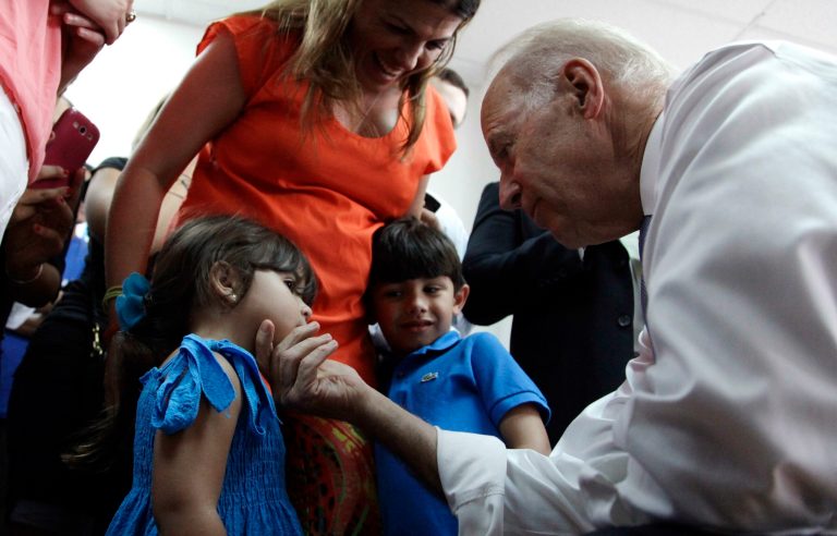 Former Vice President Joe Biden shown greeting Natalia Elias and her brother Guido in Miami, Saturday, May 3, 2014. An immigration proponent in the 2020 election, he said then at a speech that a "constant, substantial stream of immigrants" is important to the American economy.