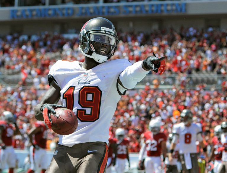 Mike Williams celebrates on Sept. 29, 2013, after catching a first quarter touchdown pass while playing for the Tampa Bay Buccaneers in Tampa, Florida. Williams died on Tuesday, Sept. 12, 2023, after being removed from life support three days earlier following a construction incident.