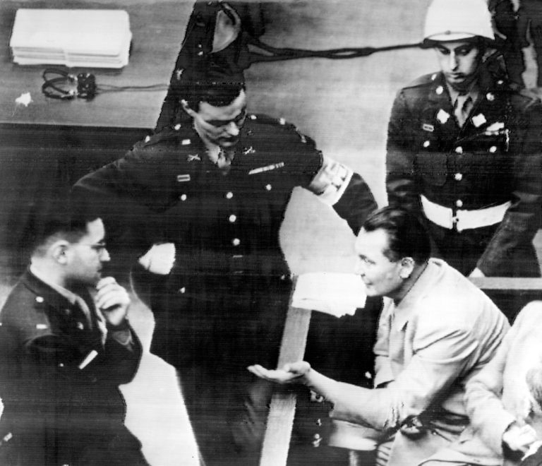 During a recess of the War Crimes Trials at Nuremberg, Germany  Nov. 24, 1945 Hermann Goering talks to (left to right) Lt. Gustav Gilbert, New York City, and Lt. Richard Nalle, Culpepper, Virginia, and an unidentified MP. An ABC News analyst wants Trump to go through a truth and accountability phase of his Senate impeachment trial.