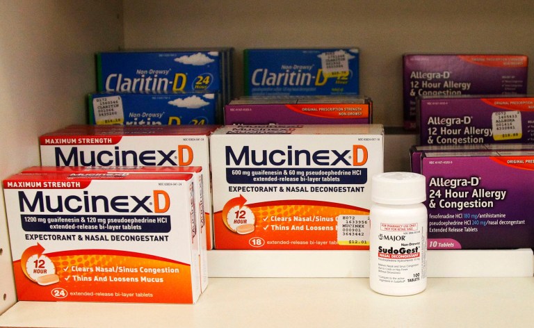 FILE - This July 19, 2010 file photo shows medications containing pseudoephedrine on display behind the counter of a pharmacy in Edmond, Okla. The decongestant is an ingredient used to make methamphetamine. (AP Photo/Sue Ogrocki, File)