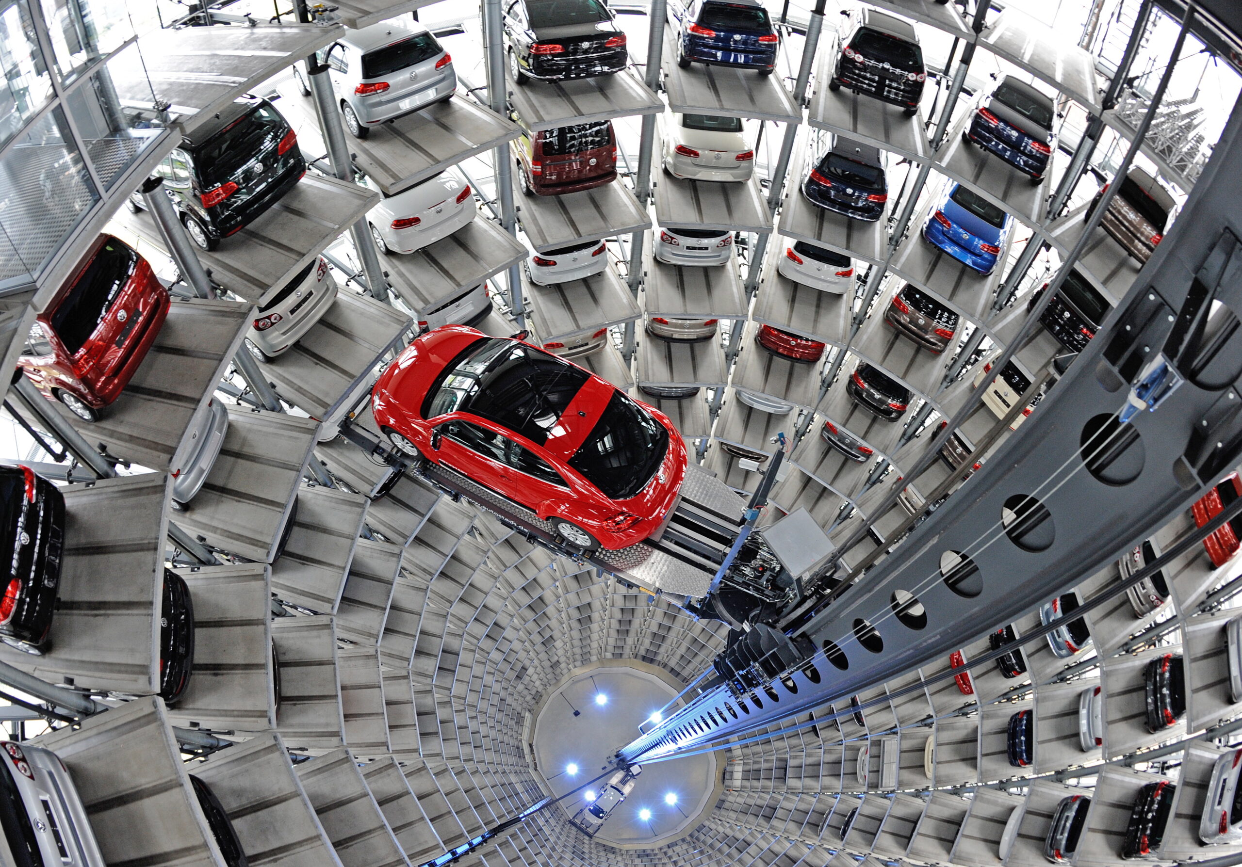 SEE IT: Scientists glue themselves to the floor of a Volkswagen exhibit hall