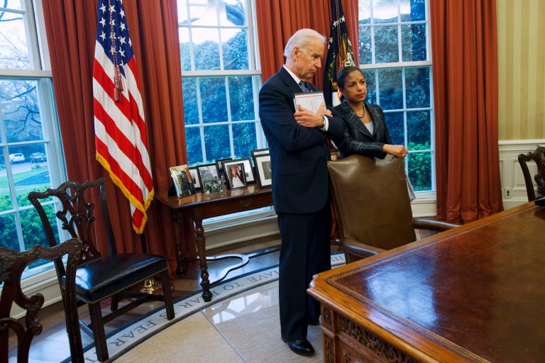 Former Vice President Joe Biden talks with National Security Adviser Susan Rice in the Oval Office in April 2015. Rice is highlighting her relationship with Dr. Anthony Fauci in her updated book as she lobbies to be Biden's running mate.