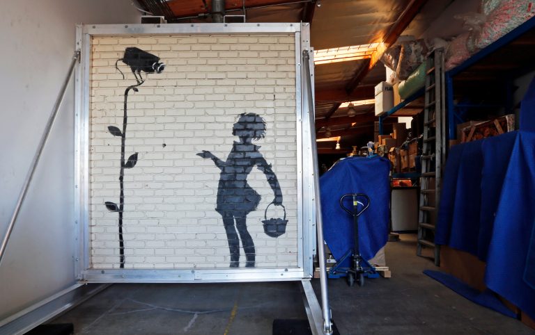 Wall art with building attached to be auctioned off in Los Angeles