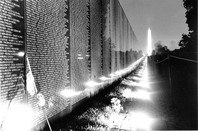 Small lights in the ground illuminate the Wall of the Vietnam Veterans Memorial in Washington, D.C. on Friday night on Sept. 21, 1984. Today's Memorial Day ceremony has been pushed back to late September due to concerns about the cornonavirus.