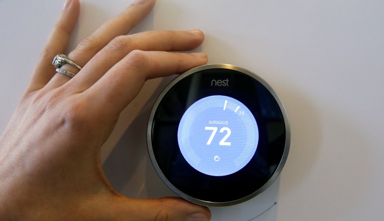 The Nest Learning Thermostat is on display following a news conference Wednesday, June 17, 2015, in San Francisco.
