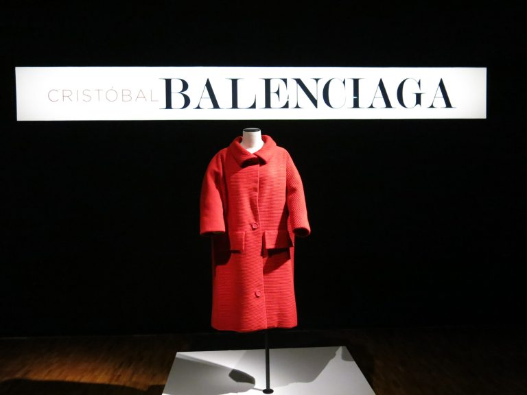 A red wool coat from the (circa 1957) Spring-Summer collection of Spain's late designer Cristobal Balenciaga stands on exhibit at the Modern Art Museum of Mexico in Mexico City, Thursday, April 28, 2016. 
