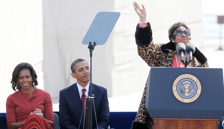 Aretha Franklin sings before President Barack Obama speaks during the dedication of the Martin Luther King Jr. Memorial in Washington, Sunday, Oct. 16, 2011. Also pictured is first lady Michelle Obama.