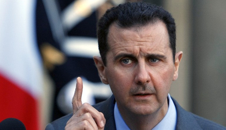 Syria President Bashar al-Assad addresses reporters following his meeting with French President Nicolas Sarkozy at the Elysee Palace in Paris, Thursday Dec. 9, 2010.