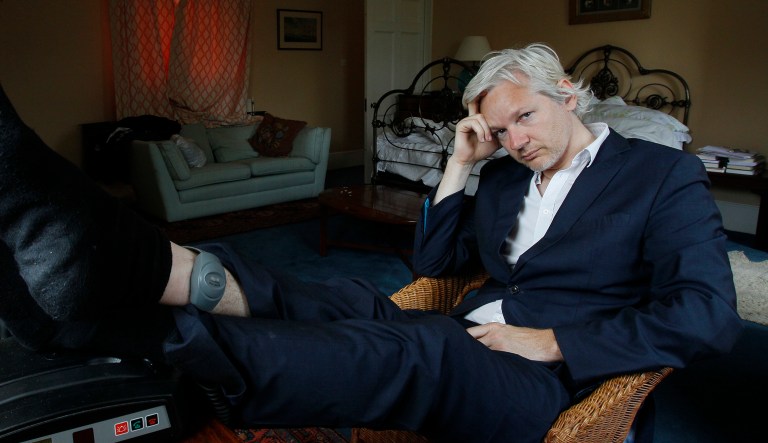 In this Wednesday, June 15, 2011 file photo, WikiLeaks founder Julian Assange is seen with his ankle security tag at the house where he is required to stay, near Bungay, England.