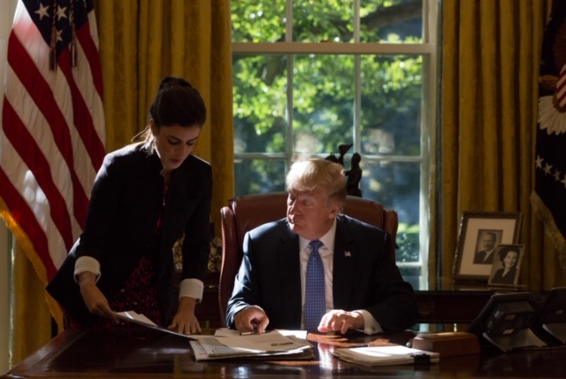 Former Director of Oval Office Operations Madeleine Westerhout with the president.