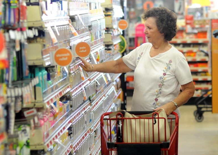 In this Sept. 4, 2014 photo, Frances Gurley shops at a Family Dollar store in Wilmington, N.C. The Commerce Department releases its August report on consumer spending, which accounts for 70 percent of economic activity, on Monday, Sept. 29, 2014.  (AP Photo/The Star-News, Matt Born)