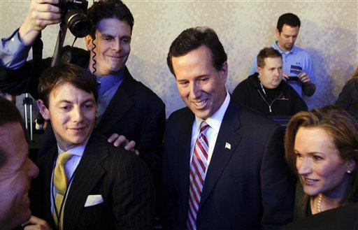 Republican presidential candidate former Pennsylvania Sen. Rick Santorum greets supporters after his caucus night rally in Johnson, Iowa, Tuesday, Jan. 3, 2012. 