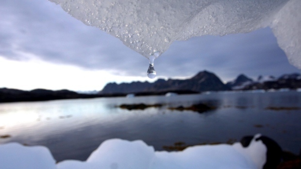 An iceberg melts in Kulusuk, Greenland near the arctic circle, Aug. 16, 2005. (AP / John McConnico)