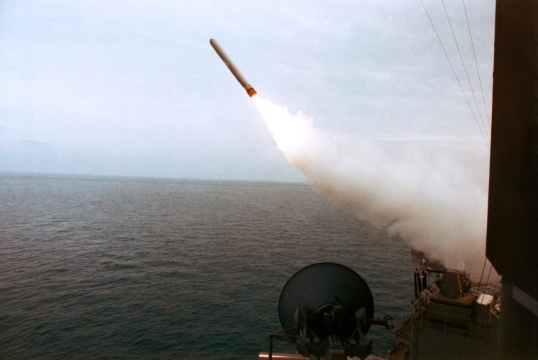 In the Persian Gulf, January 1991, a Tomahawk cruise missile is fired off the battleship USS Wisconsin towards a target in Iraq. (AP Photo/ John McCutcheon)