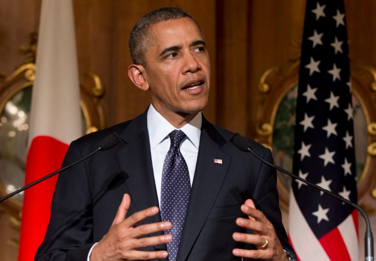 President Barack Obama gestures as he speaks during a joint news conference with Japanese Prime Minister Shinzo Abe at the Akasaka Palace State Guest House in Tokyo Thursday, April 24, 2014. Obama says new sanctions targeting Russia are, quote, 