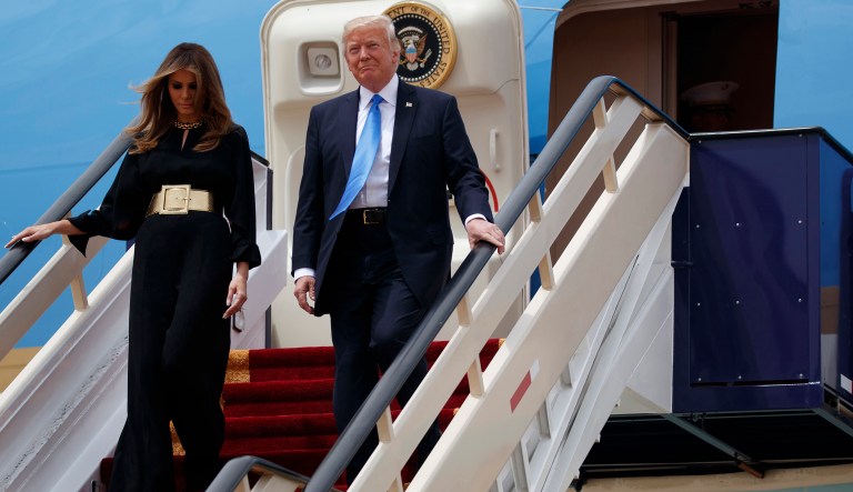 President Donald Trump and first lady Melania Trump arrive for a welcome ceremony at the Royal Terminal of King Khalid International Airport, Saturday, May 20, 2017, in Riyadh. (AP Photo/Evan Vucci)