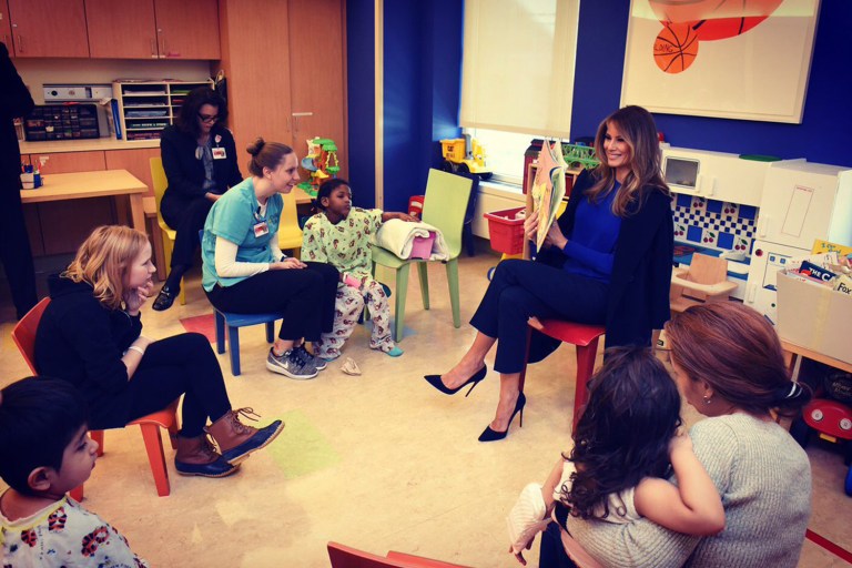 The first lady — decked in black stilettos and a cobalt-blue sweater — visited the children on Thursday. (Courtesy: FLOTUS Twitter)