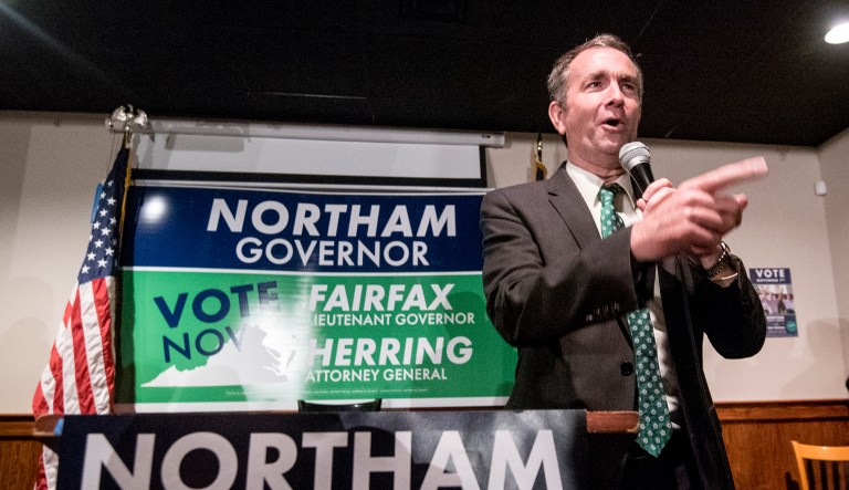 Some Democrats see similarities between Clinton and Northam as candidates, while Republican gubernatorial candidate Ed Gillespie's bare-knuckled television campaign ads have borrowed a page from President Trump's pugilistic playbook. (Daniel Lin/Daily News-Record via AP)