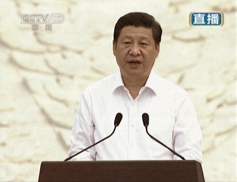 In this image taken from video, China's President Xi Jinping speaks during a ceremony marking the 77th anniversary of the start of a war with Japan amid rising tensions between Beijing and Tokyo, at the Museum of the War of the Chinese People's Resistance Against Japanese Aggression Monday, July 7, 2014,  in Beijing, China.  This year's unusually high-profile commemoration of the 1937 Marco Polo Bridge Incident, including a nationally televised speech by Xi, comes amid an anti-Japanese propaganda campaign by Beijing. (AP Photo/CCTV via AP Video) CHINA OUT, NO SALES, NO ARCHIVES, EDITORIAL USE ONLY