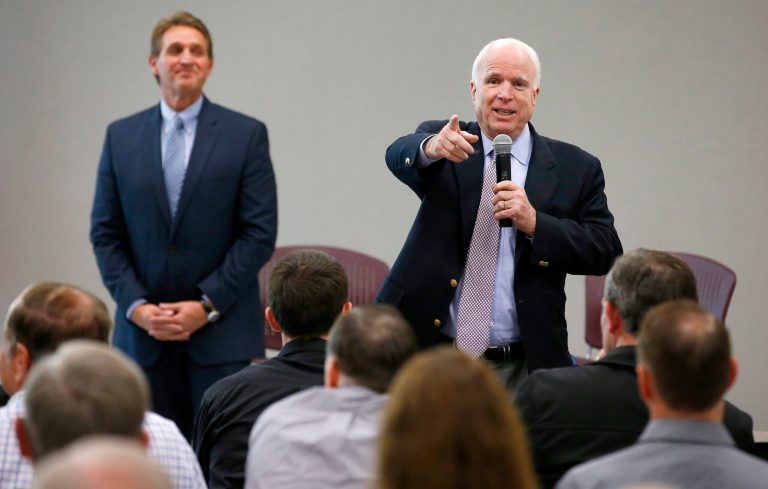 Arizona Republican Sens. John McCain, right, and Jeff Flake scheduled a press conference on Wednesday to discuss payments made by the Pentagon to the NFL, MLB, and the NHLÂ to honor service members at sporting events.Â (AP Photo/Ross D. Franklin)